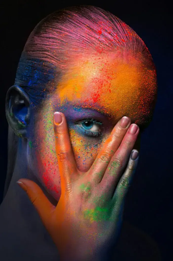 Model with colorful art make-up, close-up