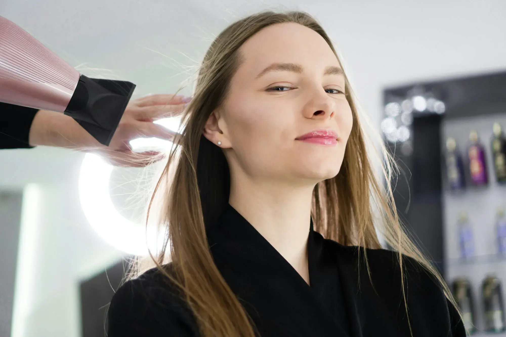 Young woman at hairdresser salon